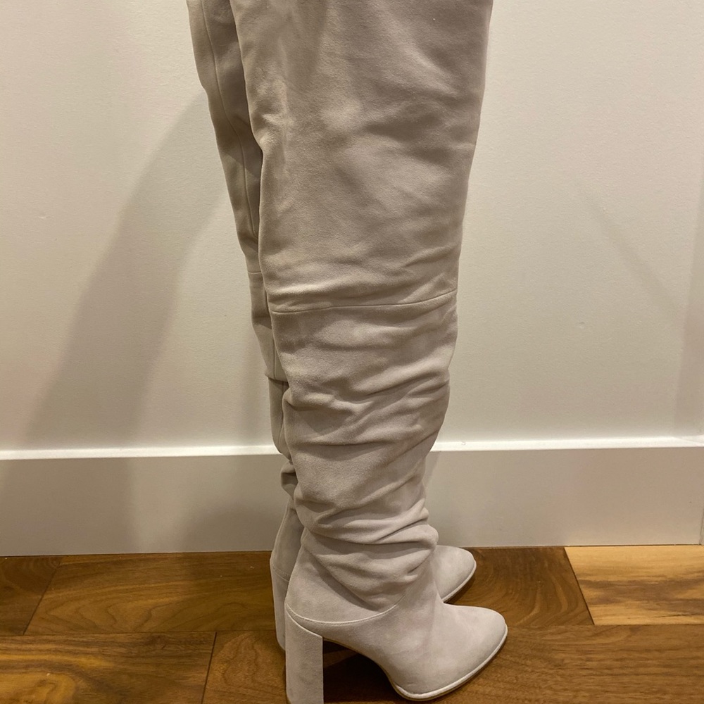 Brand new Stuart Weitzman thigh high boots.